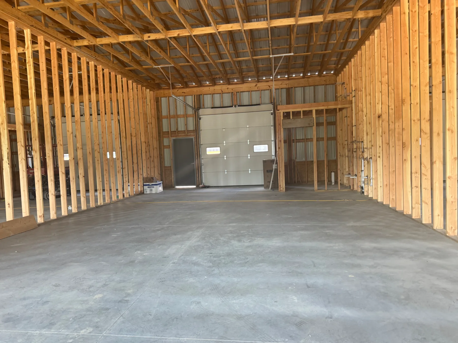 Framed walls marking out individual rooms inside the Ivory Blossom Salon under construction